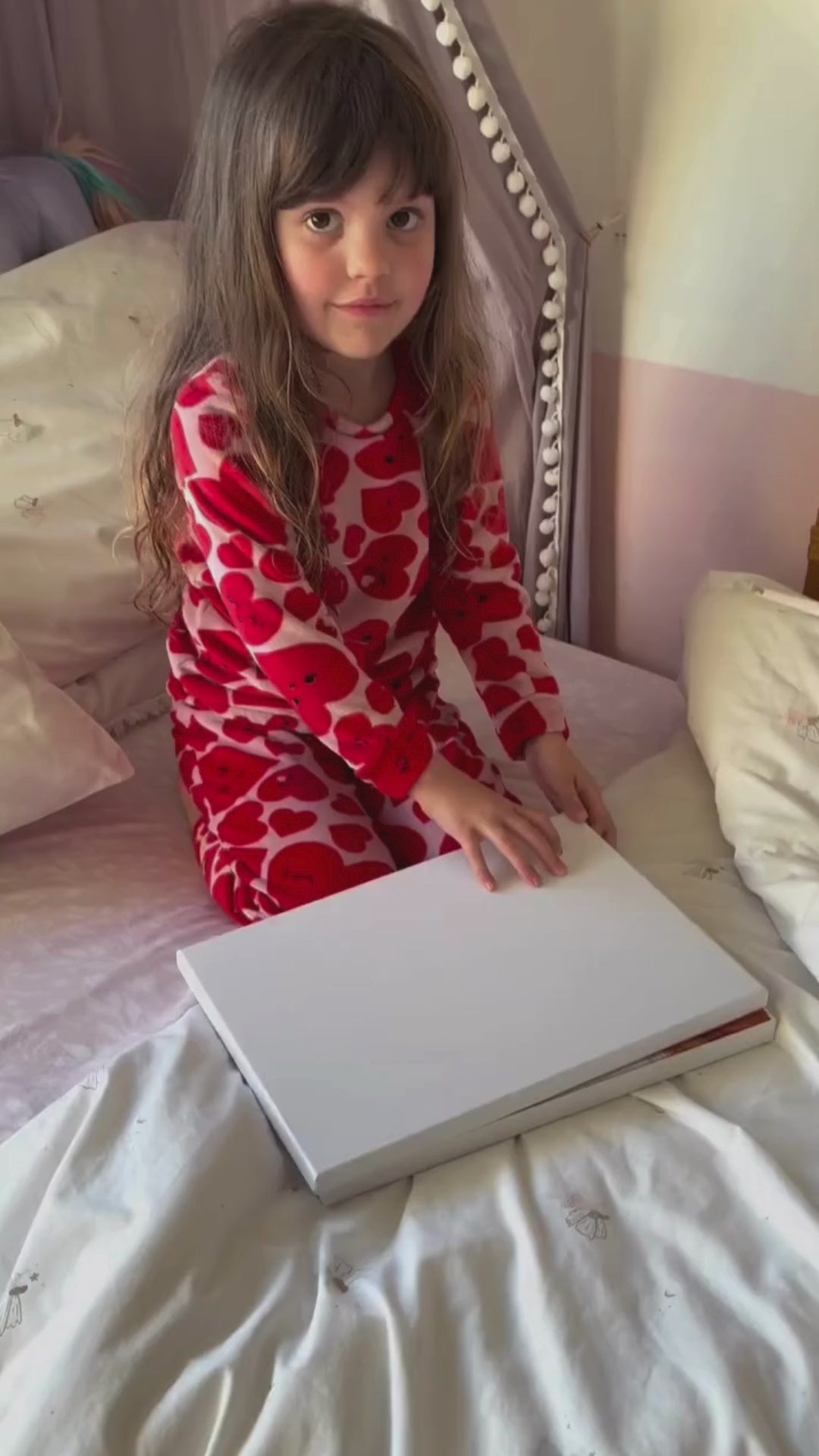 Load video: Ophelia opening her copy